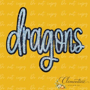 May include: A decorative patch featuring the word dragons written in a cursive script. The letters are filled with iridescent, light-reflecting sequins and outlined with a thick, solid black border against a mustard yellow background.