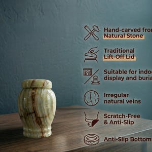 May include: A light green and brown natural stone urn with a lift-off lid. Text features include: Hand-carved from Natural Stone, Traditional Lift-Off Lid, Suitable for indoor display and burial, Irregular natural veins, Scratch-Free & Anti-Slip, Anti-Slip Bottom.