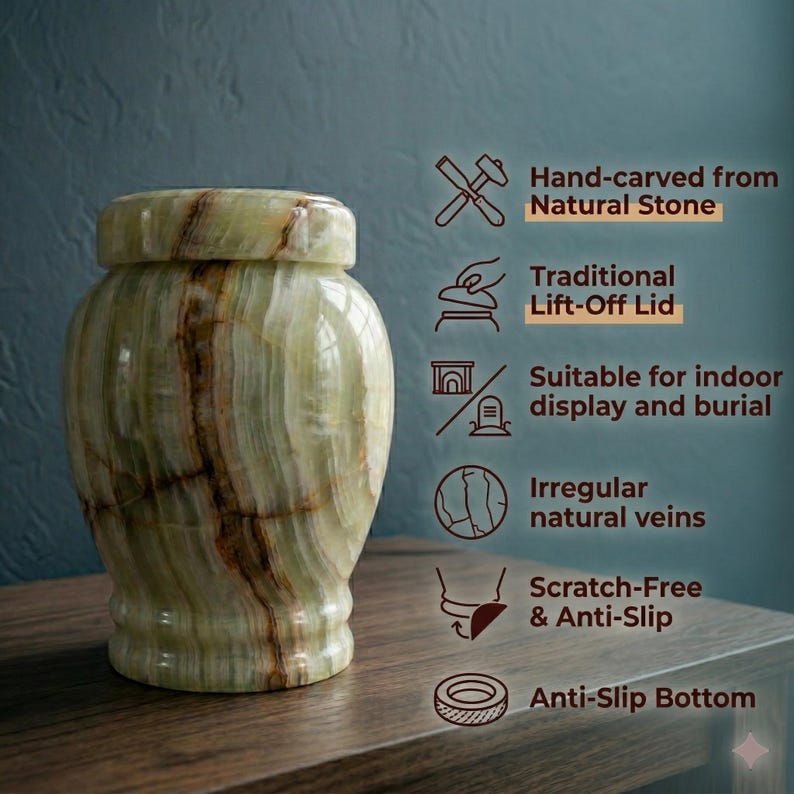 May include: A light green and brown natural stone urn with a lift-off lid and irregular veins. Text on the image reads: Hand-carved from Natural Stone, Traditional Lift-Off Lid, Suitable for indoor display and burial, Irregular natural veins, Scratch-Free & Anti-Slip, Anti-Slip Bottom.