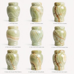 May include: Nine stone urns arranged in a grid, each featuring a unique natural pattern. The urns display variations of green, white, brown, and orange hues, labeled 1 through 9 with descriptions like Soft Sage Green and Green with Multi Color Layers.