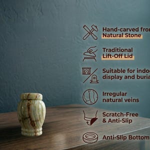 May include: A small, cylindrical natural stone urn featuring light green and brown veining with a matching lift-off lid. Text on the right lists features: Hand-carved from Natural Stone, Traditional Lift-Off Lid, Suitable for indoor display and burial, Irregular natural veins, Scratch-Free & Anti-Slip, and Anti-Slip Bottom.