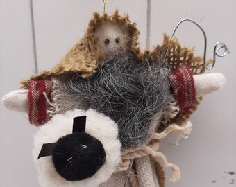 Hand Sewn Shepherd Christmas Ornament with Sheep