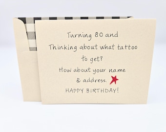 May include: A humorous birthday card with a black and white checkered pattern on the top. The card reads "Turning 80 and Thinking about what tattoo to get? How about your name & address. HAPPY BIRTHDAY!"