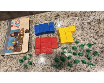 Juego completo de bloques de construcción Tupperware Busy Blocks de 1971, con 26 bloques y 26 figuras.