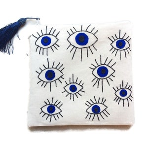 Evil eyes good luck charm, cotton pouch bag , hand embroidered , handmade, accessories pouch