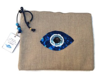 Ręcznie robiona płócienna torebka Evil Eye: haftowana kopertówka w stylu boho