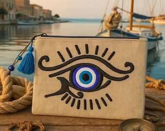 Ręcznie robiona płócienna torebka Evil Eye: haftowana kopertówka z frędzlami