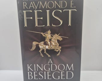 A Kingdom Besieged by Raymond E. Feist (Hardcover Book) Fantasy, Sci-fi novel