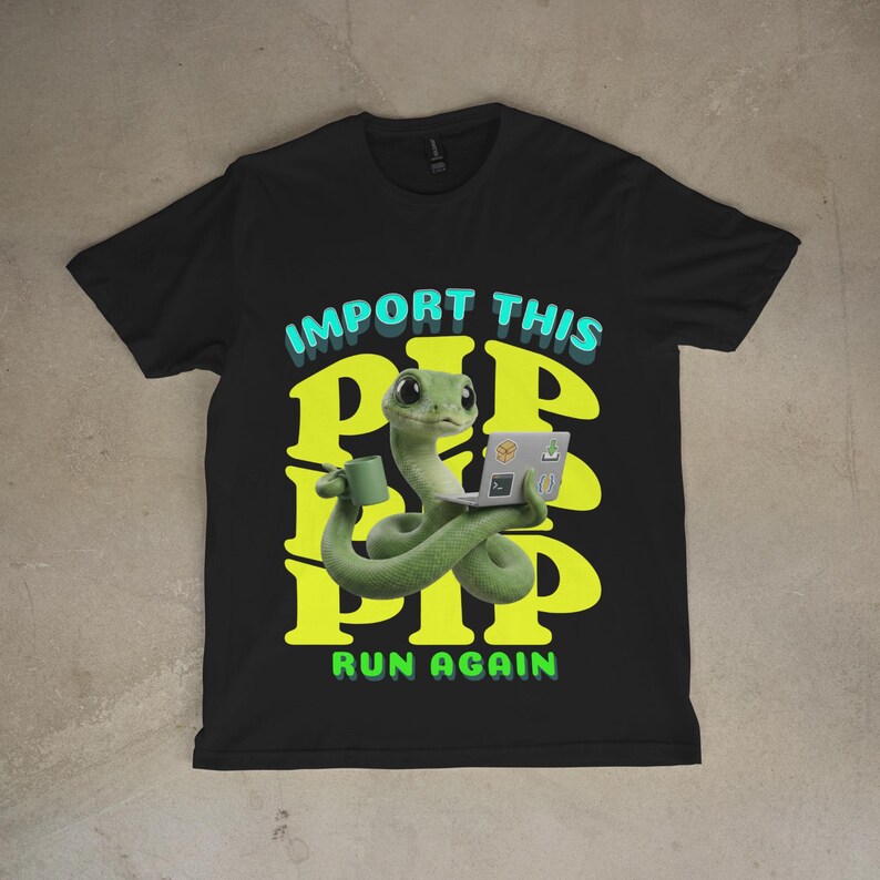 May include: Black t-shirt with a cartoon green snake using a laptop and holding a mug. The shirt displays the text "IMPORT THIS PIP PIP PIP RUN AGAIN" in a fun font. The design incorporates green, yellow, and blue colours.