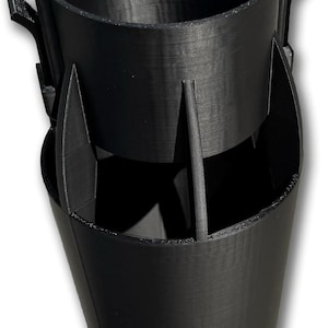 May include: Black, 3D-printed car cup holder with a two-tiered design. The upper section is a cylindrical cup holder, and the lower section has a flared shape. The holder has vertical dividers and mounting tabs.