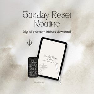 May include: A digital planner with the text "Sunday Reset Routine" and "Digital planner • Instant download." A smartphone displays "FREE MYSTERY PHONE WALL PAPER INCLUDED." A stylus rests on the tablet screen. The background is a neutral beige.