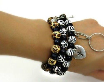 Animal print bracelet/ Leopard print bracelet/ Moo cow print bracelet/ stripe black and white bracelet/ Black bracelet/ Cross bracelet