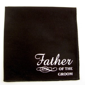 May include: Black pocket square with white text that reads "Father of the Groom".
