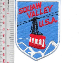 Toppa promozionale per la cabinovia sciistica di Squaw Valley, California