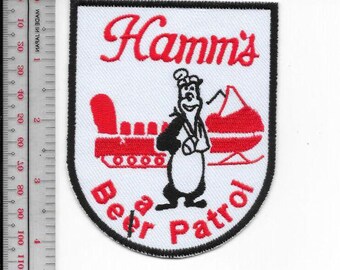 Toppa promozionale della motoslitta Hamm's Bear Patrol del 1960 e 1970.