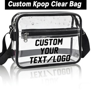 May include: A clear, rectangular crossbody bag with a black trim, zipper, and strap. The bag features the text "Custom Your Text/Logo" in bold, black letters. The top of the bag has the text "Custom Kpop Clear Bag" in black.