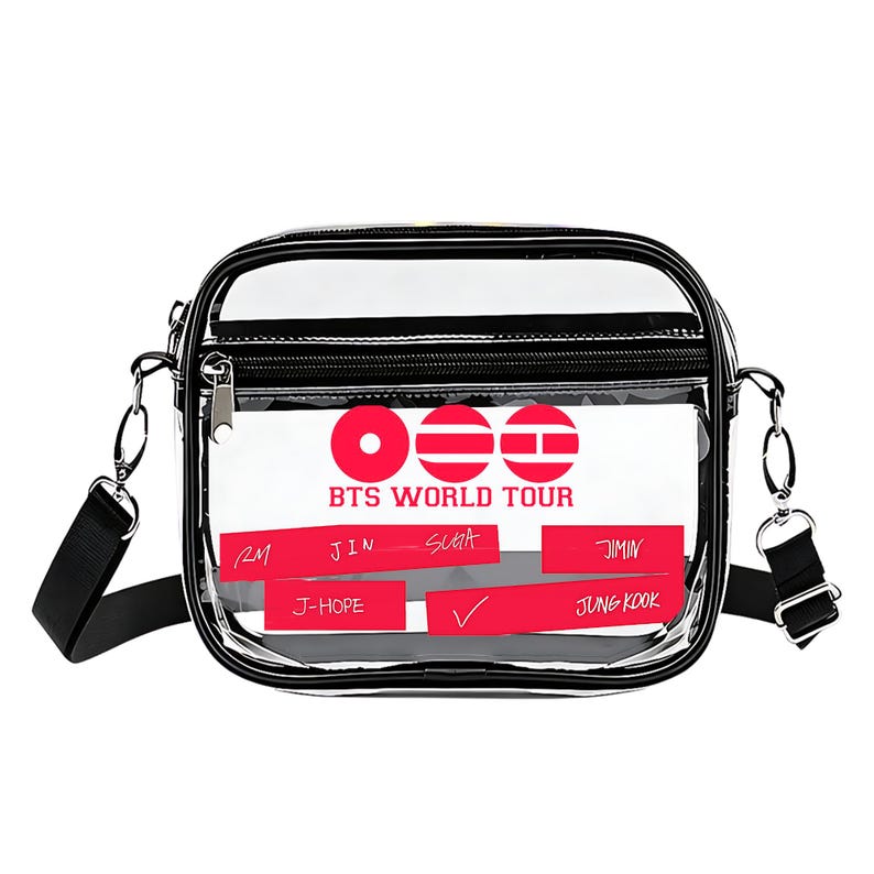 May include: Clear crossbody bag with a black trim and strap. The bag features a red and white graphic with the text "BTS WORLD TOUR" and the names of the band members. The bag has a zippered main compartment and a front pocket.