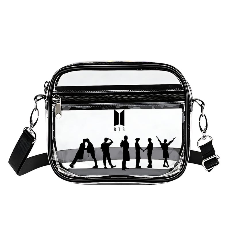 May include: Clear crossbody bag with a black trim, zipper, and adjustable strap. The bag features a black silhouette of seven figures and the letters "BTS" in white.