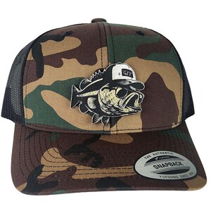 May include: Camouflage baseball cap with a black mesh back and a fish graphic. The fish is wearing a hat that says "GIT". The hat has a curved brim and a snapback closure.