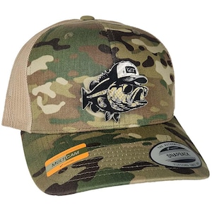 May include: A camouflage baseball cap with a mesh back. The front of the cap features a graphic of a bass wearing a hat and sunglasses. The hat has the text "GIT" on it. The brim has a "Multicam" sticker.