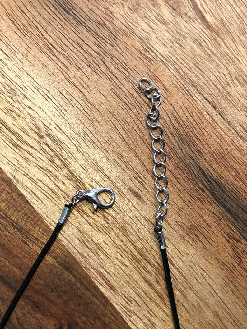 Nine-Pointed Star Pendant