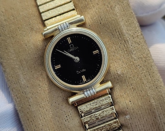 Reloj Omega De Ville 591.0235 Cal.1387 de cuarzo tono dorado para mujer, fabricado en Suiza.