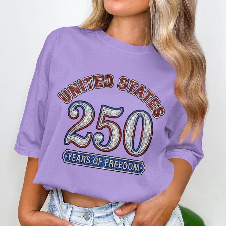 Purple t-shirt with "United States 250 Years of Freedom" text.