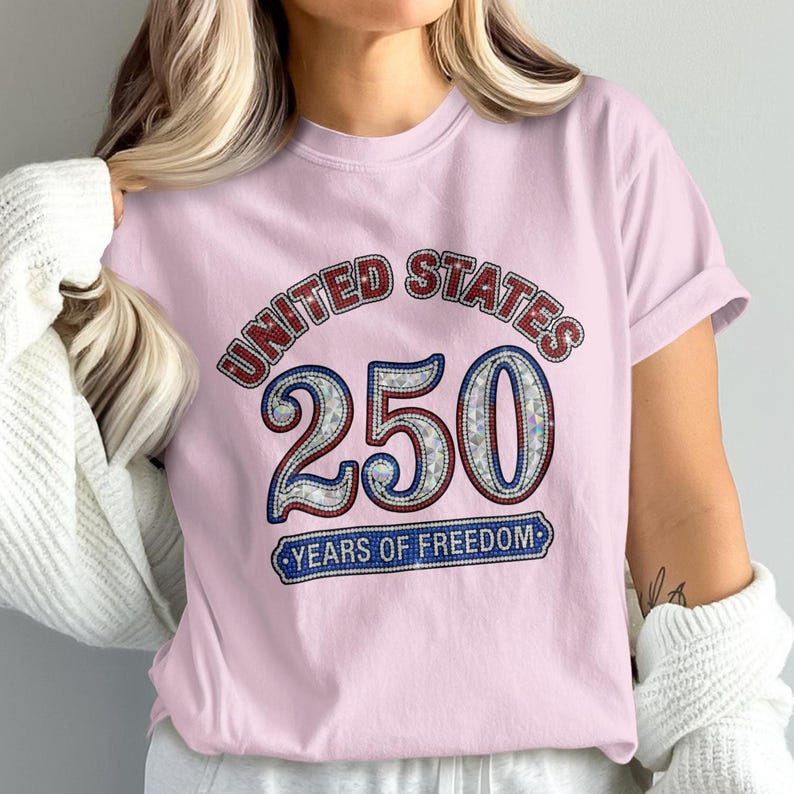 Pink t-shirt with "United States 250 Years of Freedom" text in mosaic style.