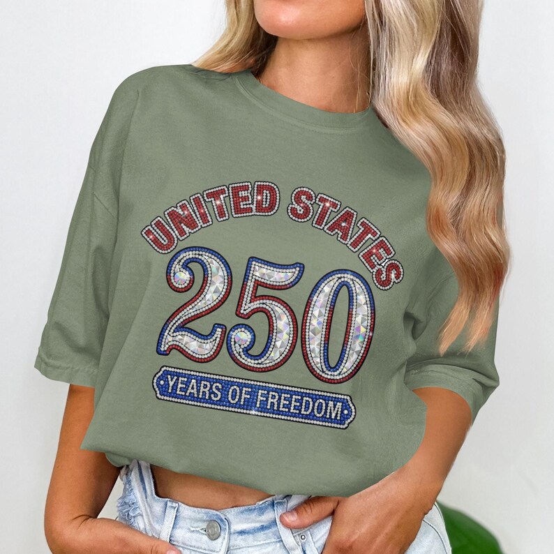 Olive green t-shirt with "United States 250 Years of Freedom" in red, white, and blue glitter.