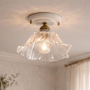 Infälld taklampa i klarglas, keramik- och koppardetaljer, nordisk modern