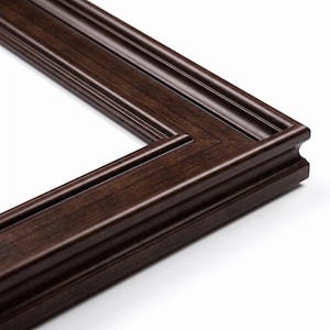 May include: A dark brown picture frame corner section featuring a multi-tiered stepped profile with clean, sharp edges. The surface displays a visible wood grain texture throughout the molding, creating a deep, rich finish on the frame border.