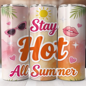 May include: Three insulated stainless steel tumblers with a summer theme. Each tumbler features a different design, including sunglasses, lips, hearts, and the text "Stay Hot All Summer". The background has a watercolour effect.