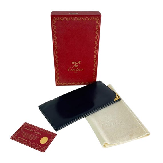 Cartera plegable larga de piel azul marino oscuro de CARTIER