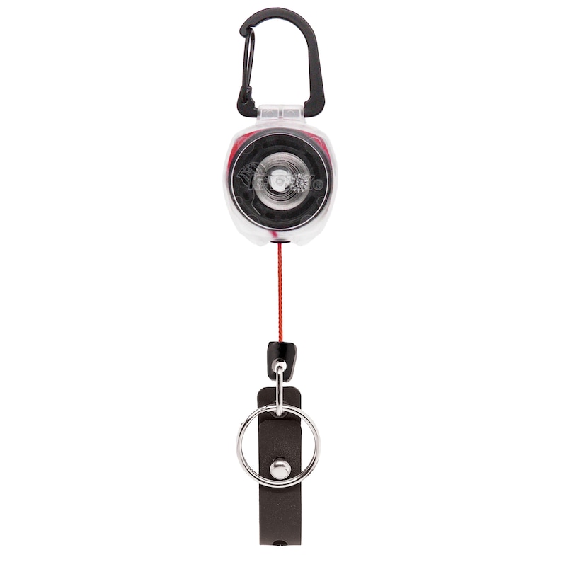May include: A retractable key reel with a black carabiner clip and a clear plastic casing. The reel has a red cord extending to a black leatherette fob with a silver key ring. The key reel is designed for attaching keys or small items.