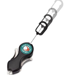 May include: A black Boomerang Tool Company line cutter with a teal circular logo featuring a white boomerang graphic. The tool has a retractable black carabiner attached by a thin line, with silver metal blades visible at the bottom end.