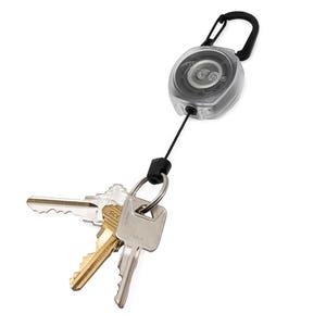 May include: A clear retractable key holder with a black carabiner clip and a black cord. Attached to the cord are three keys on a silver key ring. The key holder has a logo on the front.