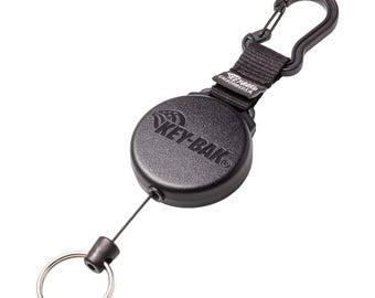 El llavero retráctil más resistente con mosquetón metálico y correa de cincha - "SECURIT". Resistente para exteriores, ideal para uso diario, ideal como regalo para linieros.