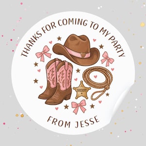 May include: A round white sticker featuring a brown cowboy hat with a pink band, a pair of brown and pink cowboy boots, a coiled lasso, a gold sheriff star badge, and pink bows. The text reads: THANKS FOR COMING TO MY PARTY FROM JESSE.