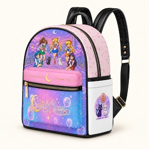 May include: A Sailor Moon backpack featuring a gradient purple and blue front panel with bubbles and the Sailor Moon logo. The top section displays anime characters and cats. A pink zippered pocket includes the text In the name of the Moon, I'll punish you! with a gold crescent moon. The side features a white panel with a circular graphic of two cats.