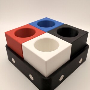 Puede incluir: Un juego de tres tazas de cer&aacute;mica con un acabado mate moteado. Las tazas son de color crema, gris claro y gris oscuro. Cada taza tiene un dise&ntilde;o simple y minimalista, ideal para caf&eacute; o t&eacute;.