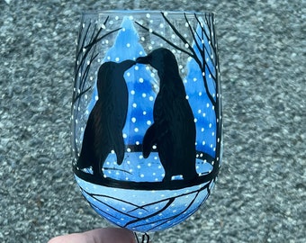 Hand painted kissing penguins wine glass