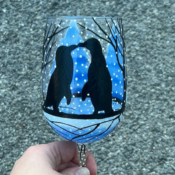 Hand painted kissing penguins wine glass