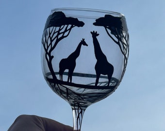 Hand painted giraffe wine glass with red base