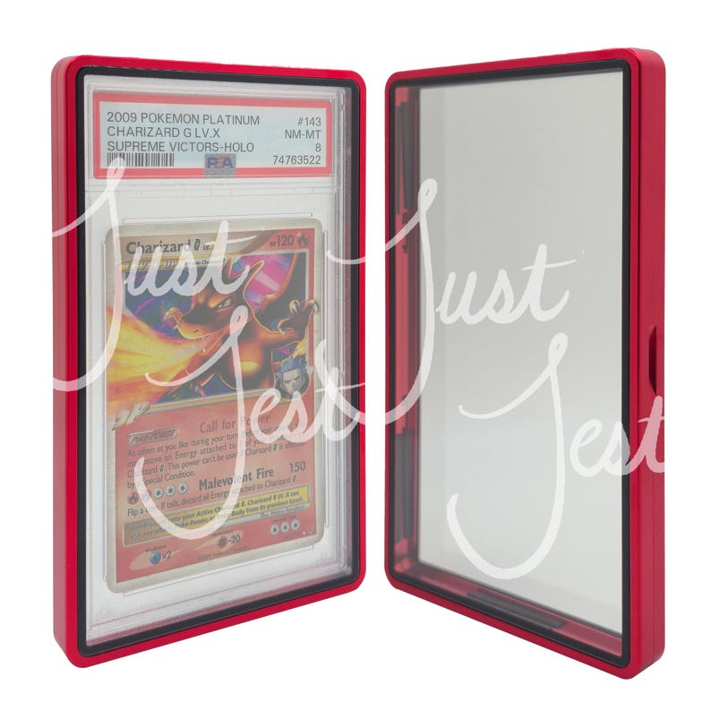May include: A red protective case for a Pokemon trading card. The card features a Charizard illustration with text that reads "2009 Pokemon Platinum Charizard G LV.X Supreme Victors-Holo". The case is open, revealing the card.