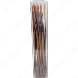 May include: A clear plastic container holding a set of brown and gold makeup brushes. The brushes are arranged vertically, with the bristles facing up. The container is rectangular and has a clear, transparent appearance.