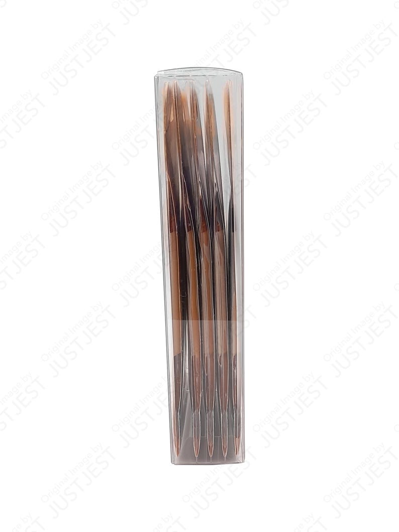 May include: A clear plastic container holding a set of brown and gold makeup brushes. The brushes are arranged vertically, with the bristles facing up. The container is rectangular and has a clear, transparent appearance.