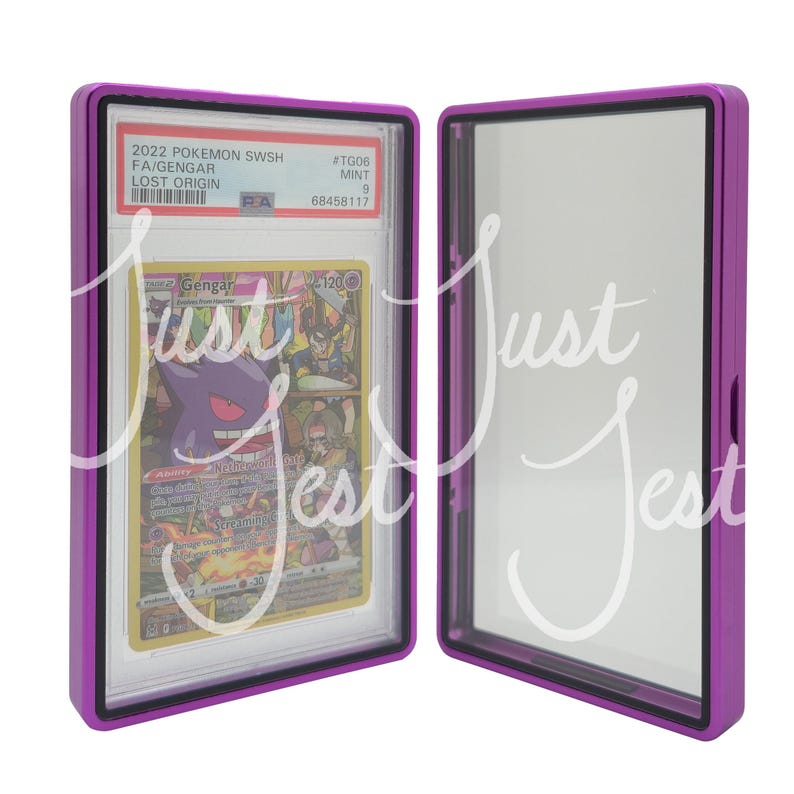 May include: A purple card holder with a clear front and back, displaying a Pokemon trading card. The card features a Gengar illustration and text. The holder is open, revealing the card and its protective case.