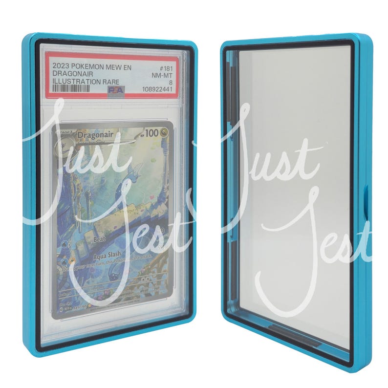 May include: Two blue protective cases for collectible cards. One case contains a Pokemon card with the text "2023 Pokemon Mew En Dragonair Illustration Rare". The card is graded NM-MT 8. The other case is empty.
