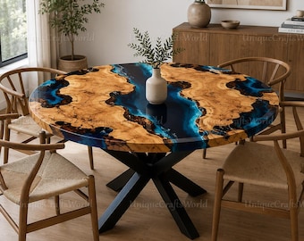 Mesa de comedor redonda de madera de raíz con resina epoxi, color azul oscuro, borde natural, base de metal.