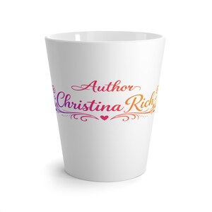 May include: A white ceramic latte mug with the text "Author Christina Rich" in a gradient of purple, orange, and yellow. The text is in a decorative script font, with a heart symbol between the words.